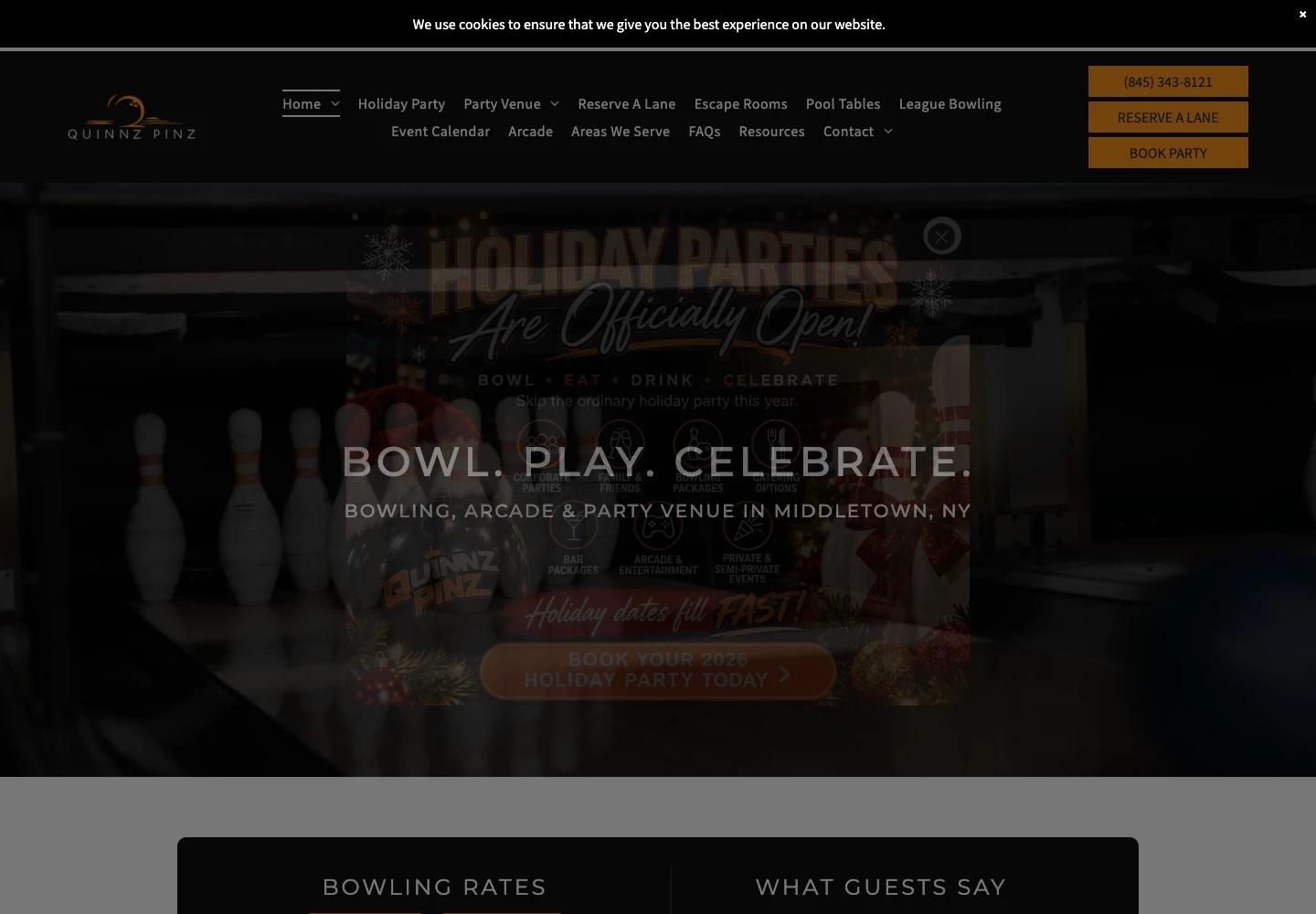 Current Quinnz Pinz homepage with a holiday promotion over its bowling hero and rates below